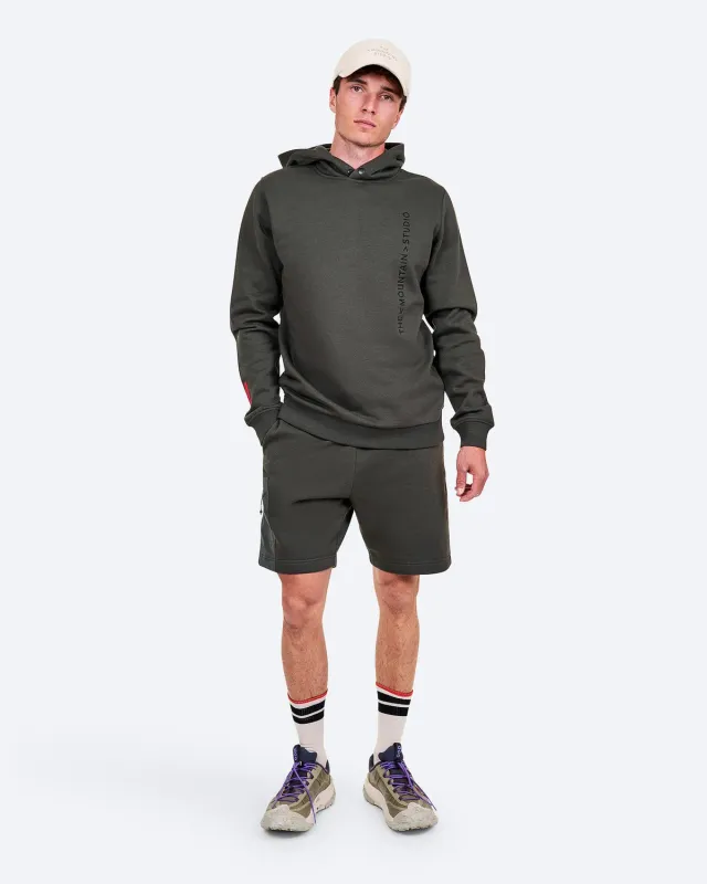 The Mountain Studio L-6 shorts Peat økologisk bomull